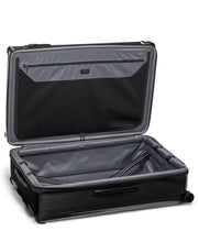 Load image into Gallery viewer, TEGRA-LITE® - Hardside Worldwide Packing Spinner Case (34") (8284016935163)